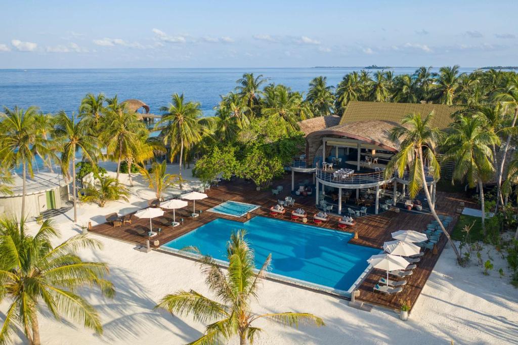 Outrigger Maldives Maafushivaru Resort, overwater pool deck